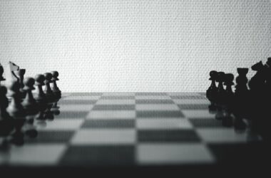 black and white chessboard set near white wall